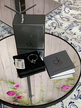 Calvin Klein Silver Fidget spin paw ring NWT sz 8